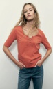 L150GTH10 REMERA ESCOTE BASE CON OJALILLOS